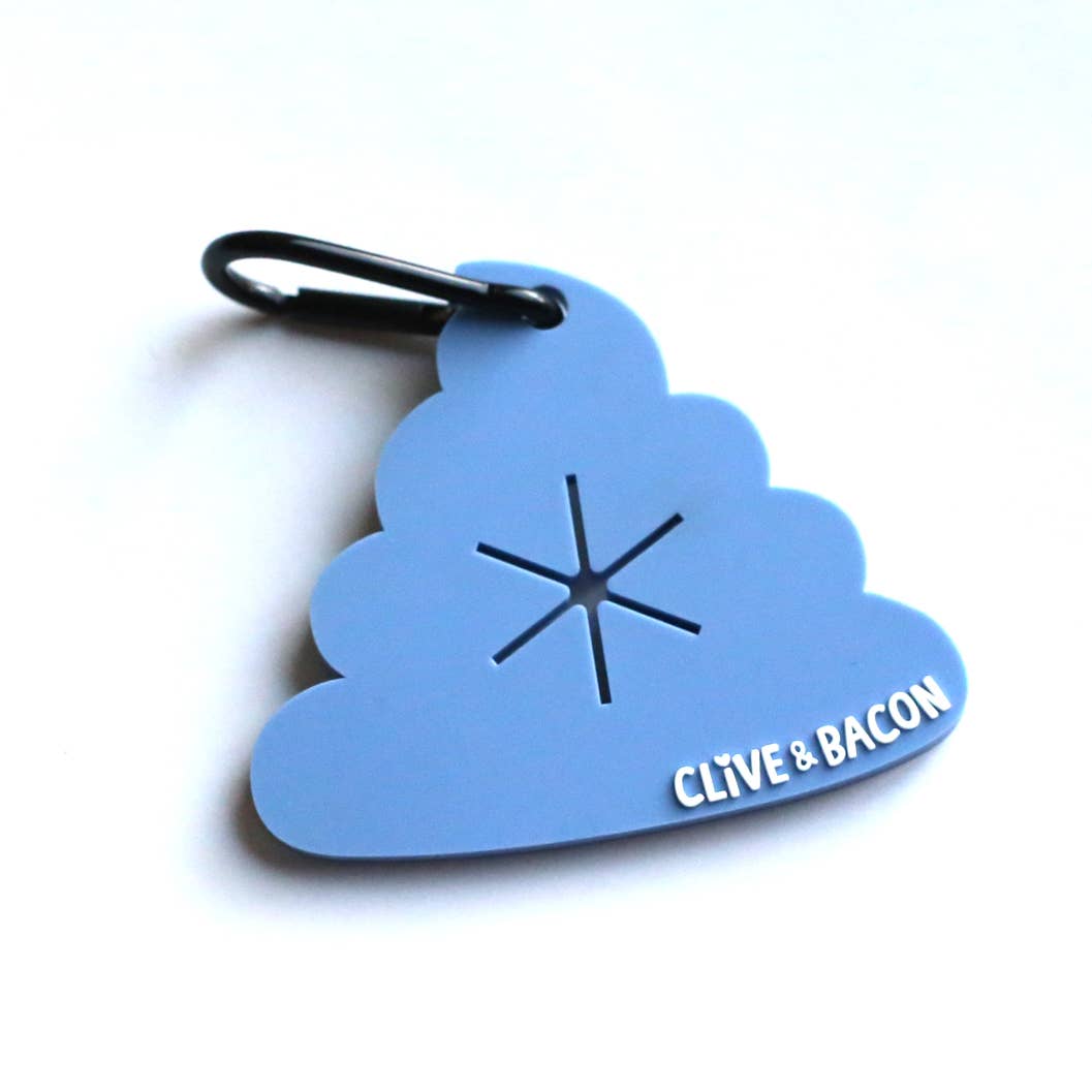 A light blue cloud-shaped keychain or tag with a black carabiner clip, featuring a starburst cutout in the center and the text 'CLIVE & BACON' in white near the bottom right.